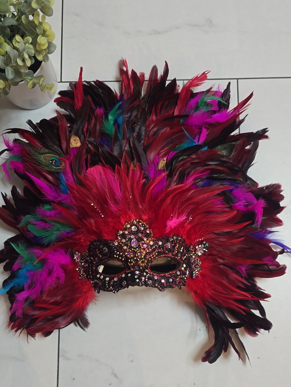Red Feathered Masquerade Mask with Multicolor Accents